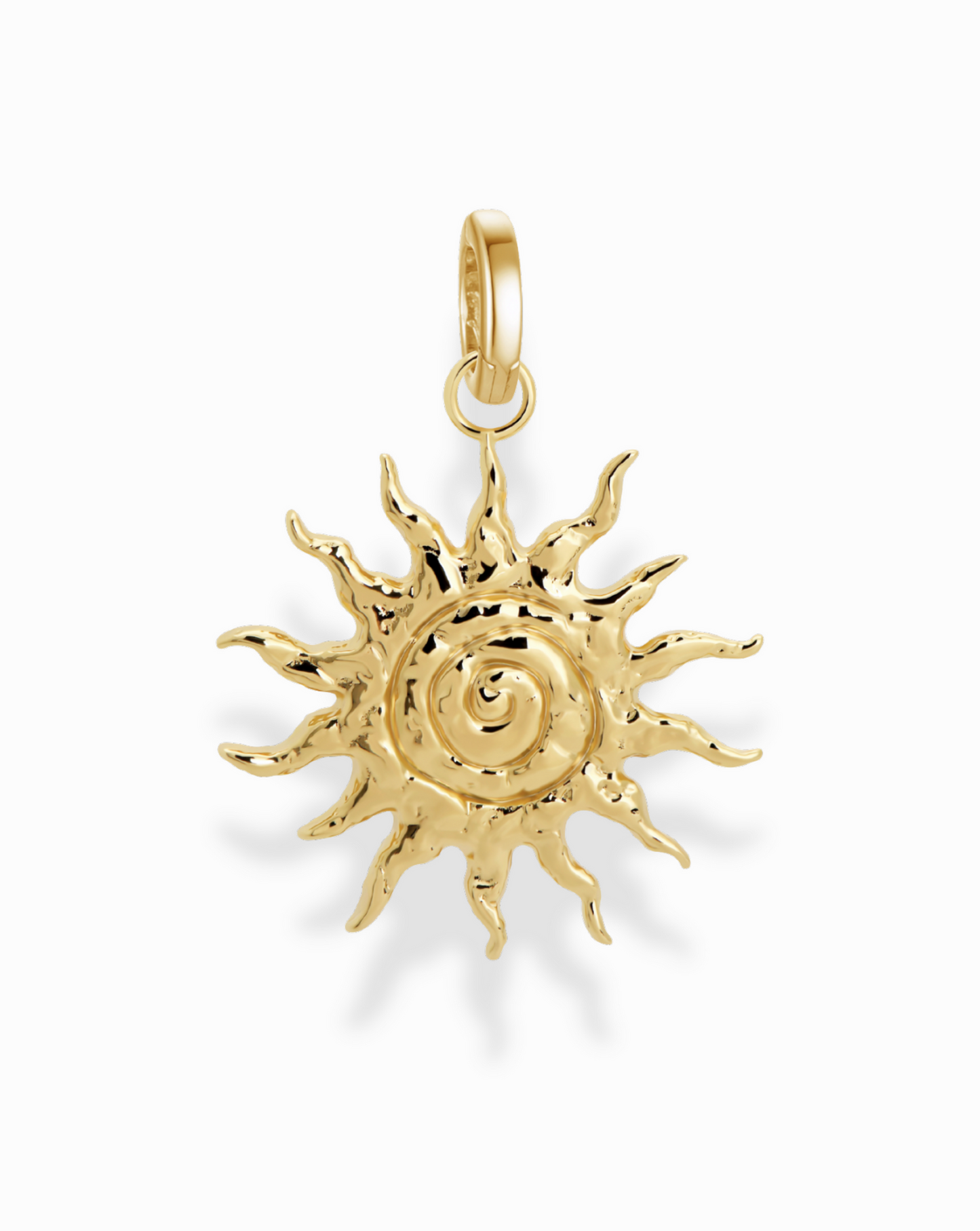 Close-up of the Gillian Spiral Sun Charm, showcasing the unique golden spiral design and intricate sun ray detailing.