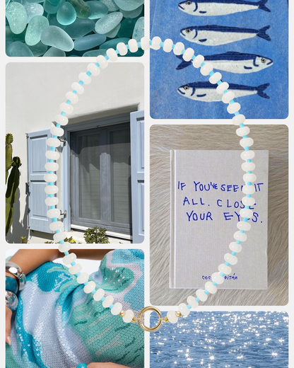 A collage with sea glass, fish illustrations, blue shutters, the Mod + Jo Macey Gemstone Necklace with white jade beads, handwritten “If you’ve seen it all, close your eyes,” sequined fabric, a cactus, and sparkling sunlit water.