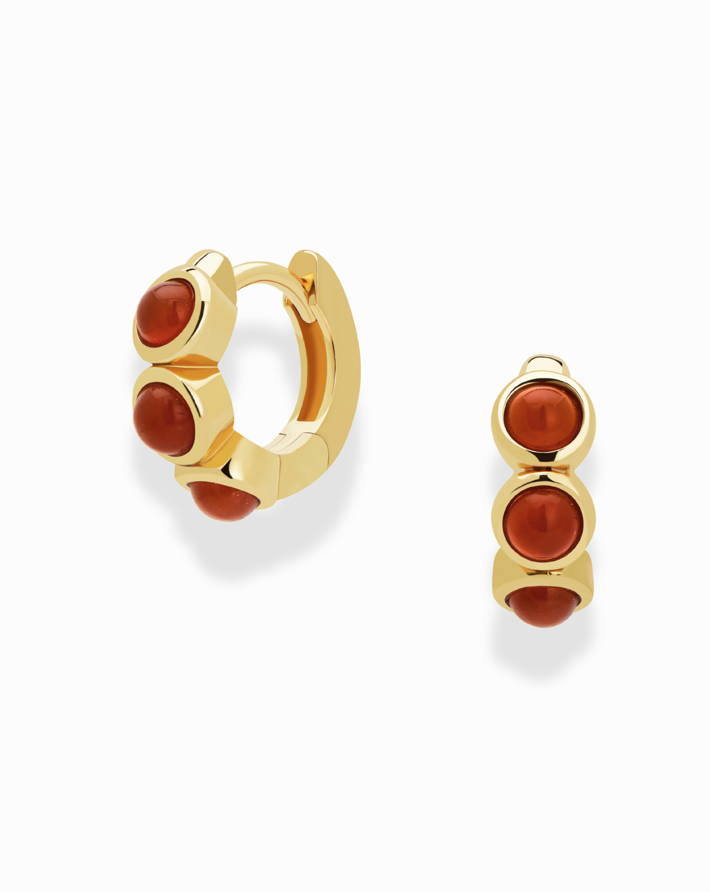 Mod + Jo’s Corynn Gemstone Huggies are 18k gold plated earrings, each featuring three vertically set natural red agate stones, shown on a plain white background.
