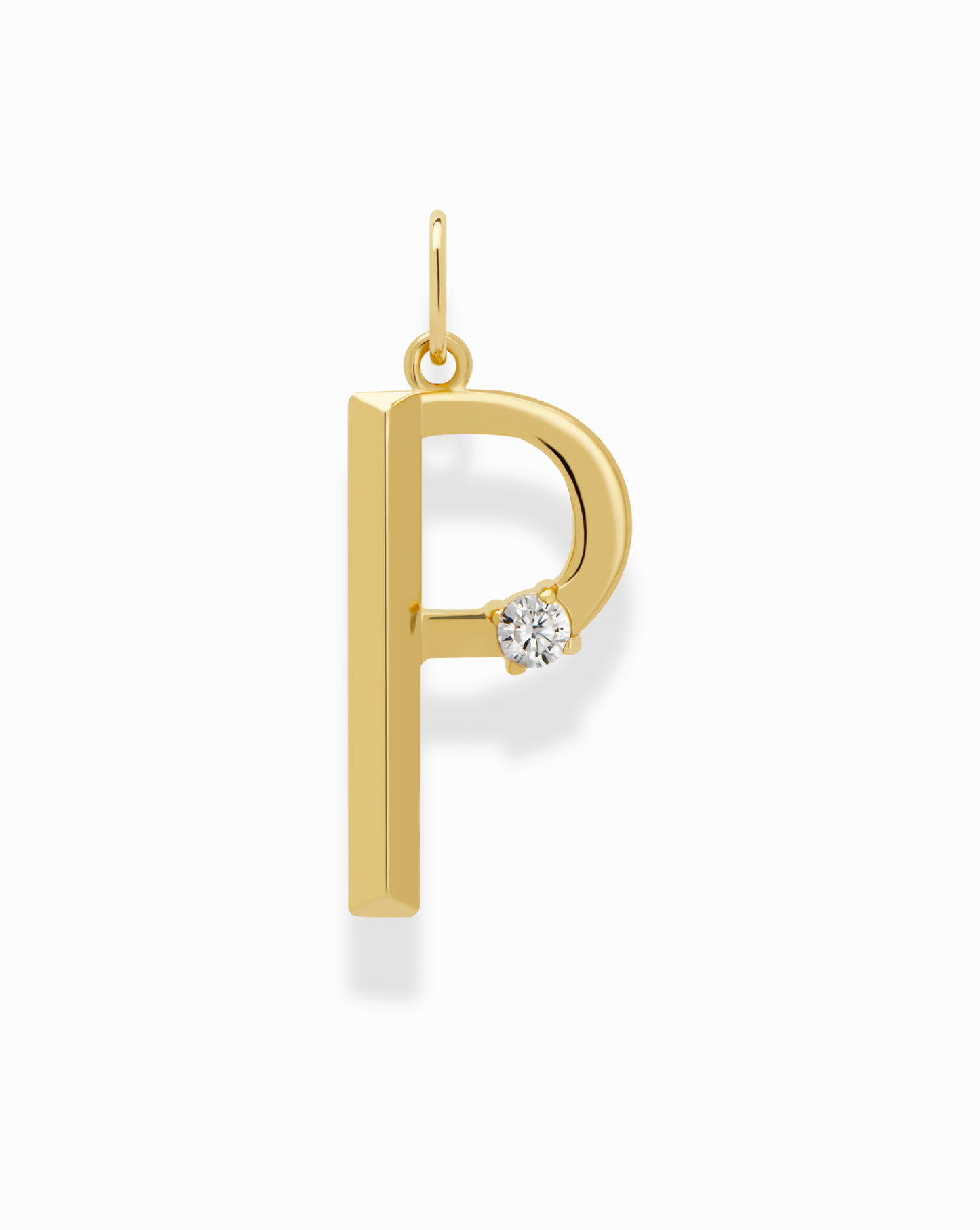 The Eloise Letter Charm by Mod + Jo features a gold pendant shaped like the letter “P” with a small round diamond accent on the curve, displayed against a white background.