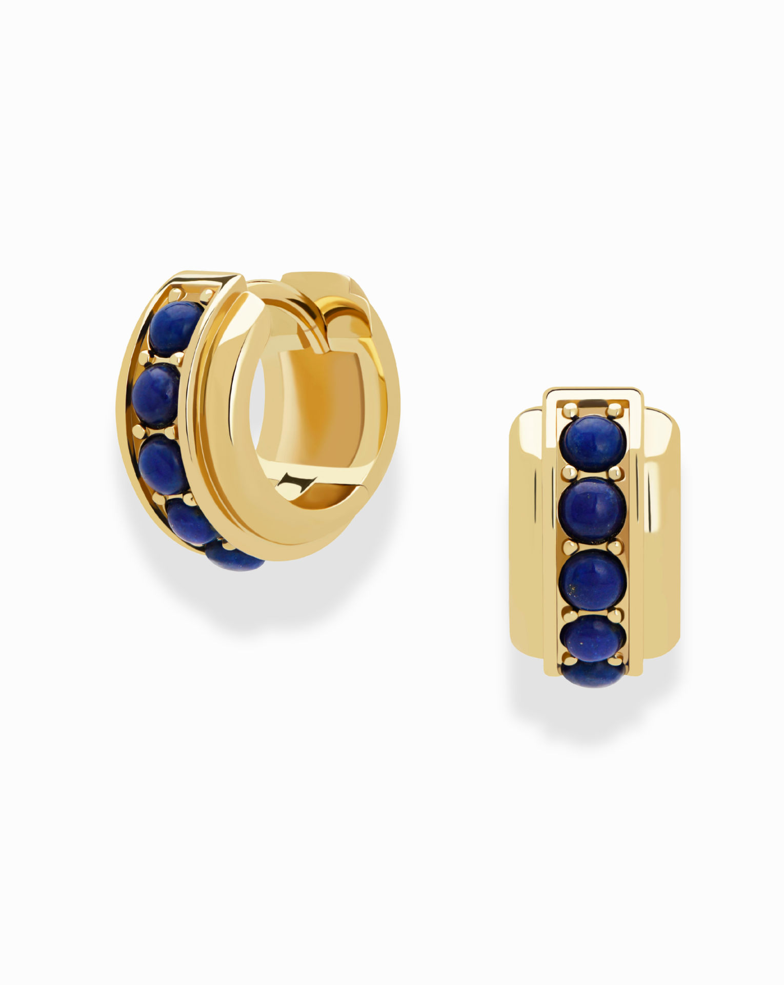 The Evy Raised Gemstone Hoops by Mod + Jo are 18k gold plated hoops, each adorned with a vertical row of five round deep blue stones, shown against a white background.