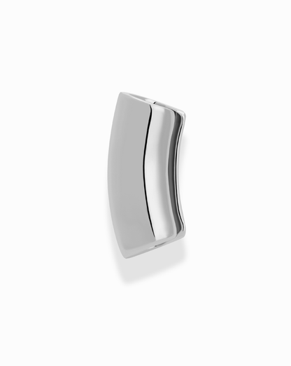 The Lennon Tube Helix Ear Cuff by Mod + Jo features a shiny, curved rectangular design in gold and silver hues with smooth edges, reflecting light on a white backdrop—a striking minimalist jewelry piece.