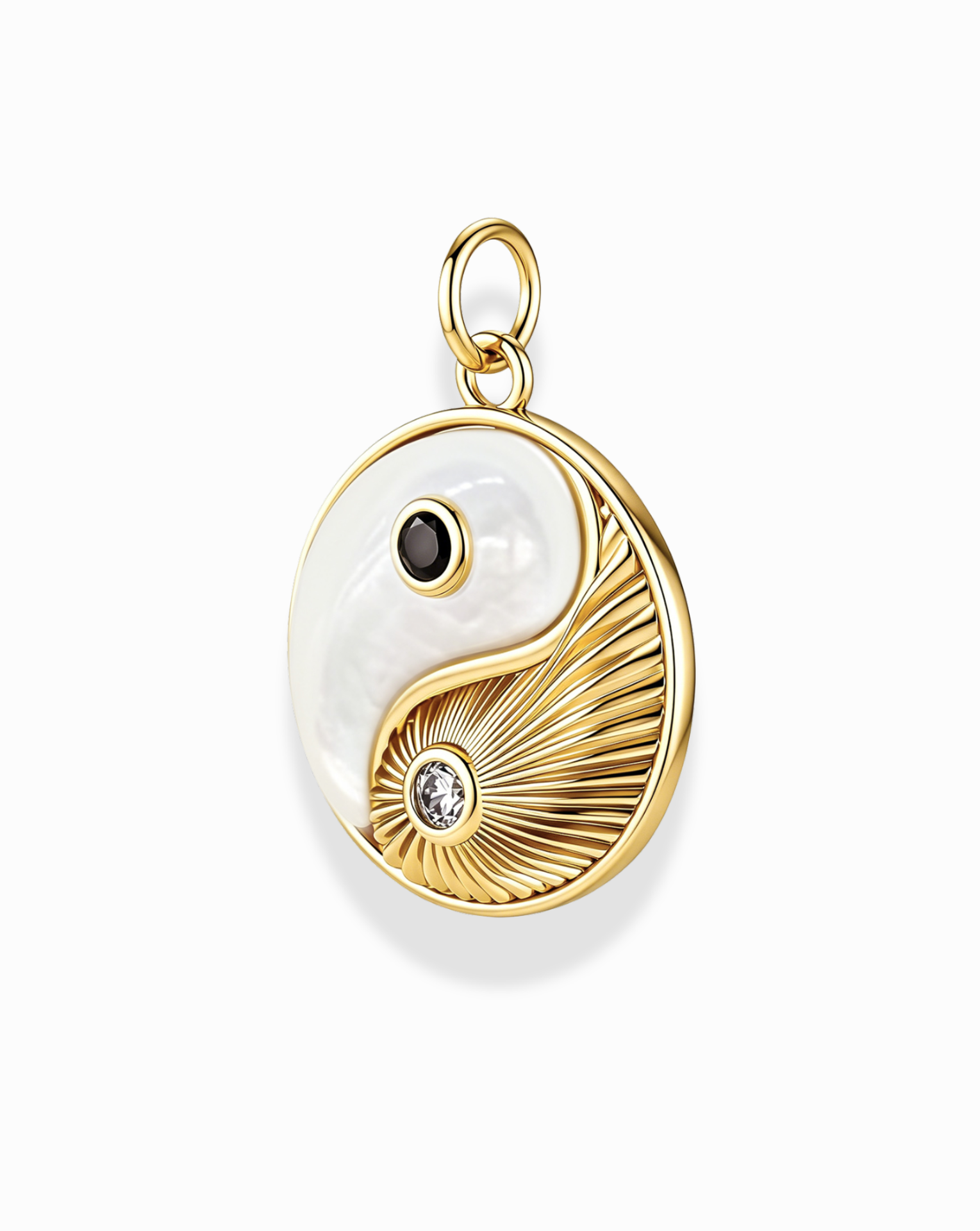 The Grande Ava Yin Yang Charm by Mod + Jo is an elegant 14k gold pendant featuring a gold and white yin-yang design with a black dot, clear gemstone, and textured gold lines set against a mother-of-pearl background—perfect for adding a refined touch to any necklace collection.