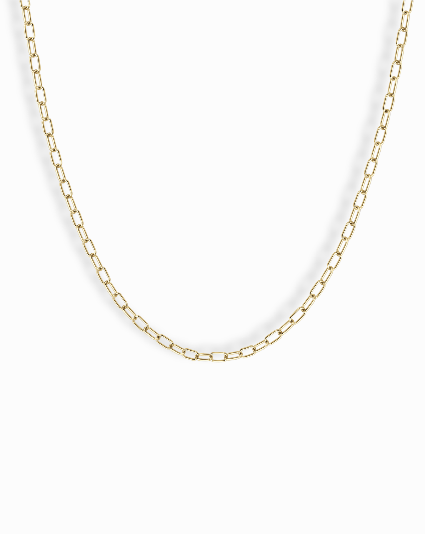The Mod + Jo Darcy Mini Paperclip Chain Necklace features small, rectangular gold plated links and is displayed against a plain white background.
