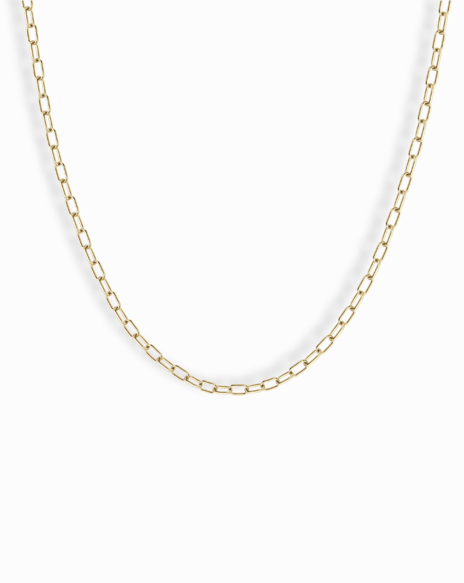 The Mod + Jo Darcy Mini Paperclip Chain Necklace features small, rectangular gold plated links and is displayed against a plain white background.