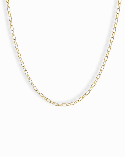 The Mod + Jo Darcy Mini Paperclip Chain Necklace features small, rectangular gold plated links and is displayed against a plain white background.