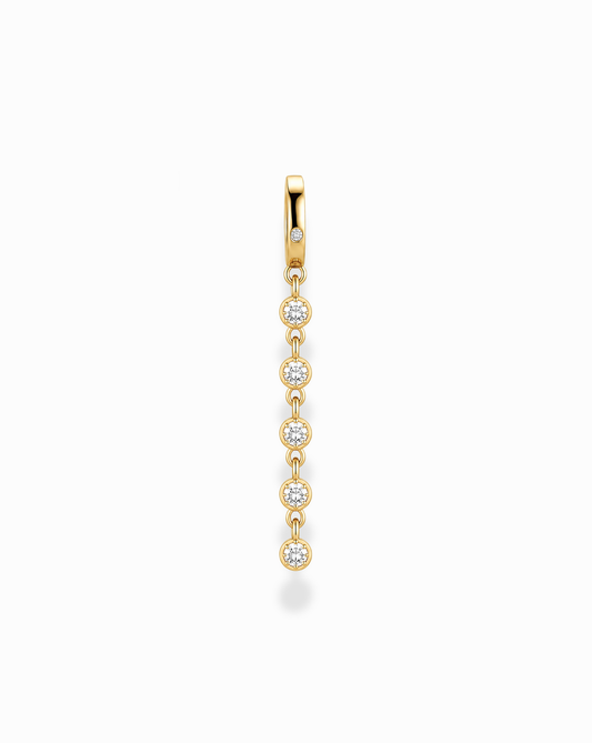 The Demi Tennis Charm by Mod + Jo features six round, vertically aligned cubic zirconia charms, each connected by delicate 14k gold-plated links, beautifully displayed on a white background.