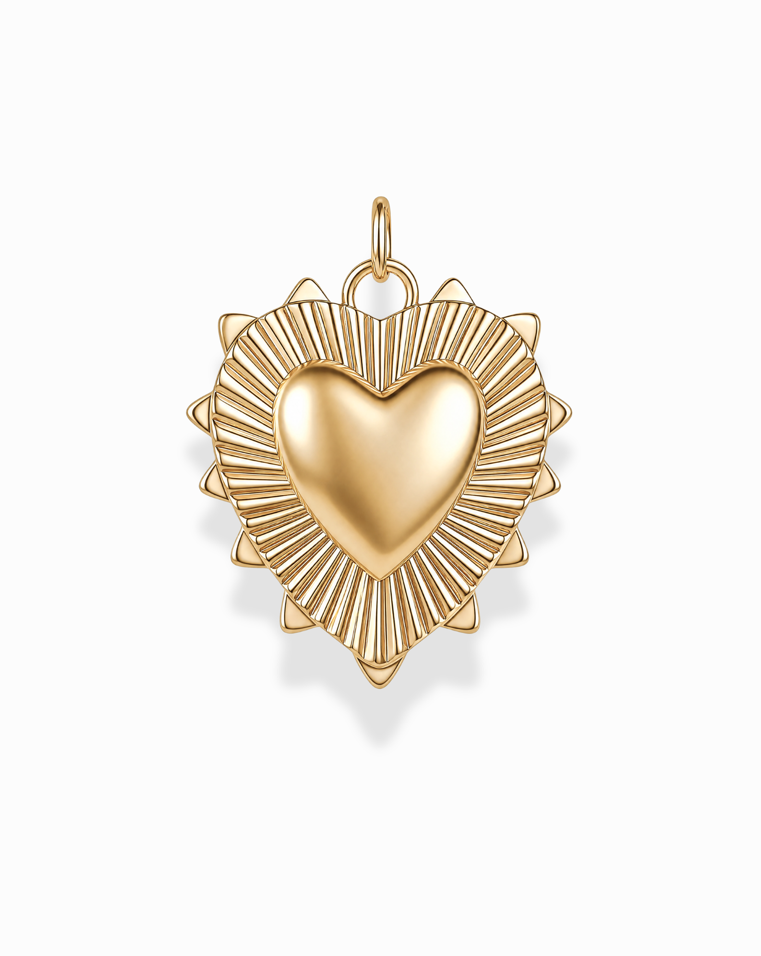 The Grande Lynn Engravable Heart Charm by Mod + Jo features a gold heart pendant with a raised center and a radiating sunburst pattern along the edges, expertly crafted in 14k gold over brass. Photographed on a white background, this customizable piece brings a timeless touch to any jewelry collection.
