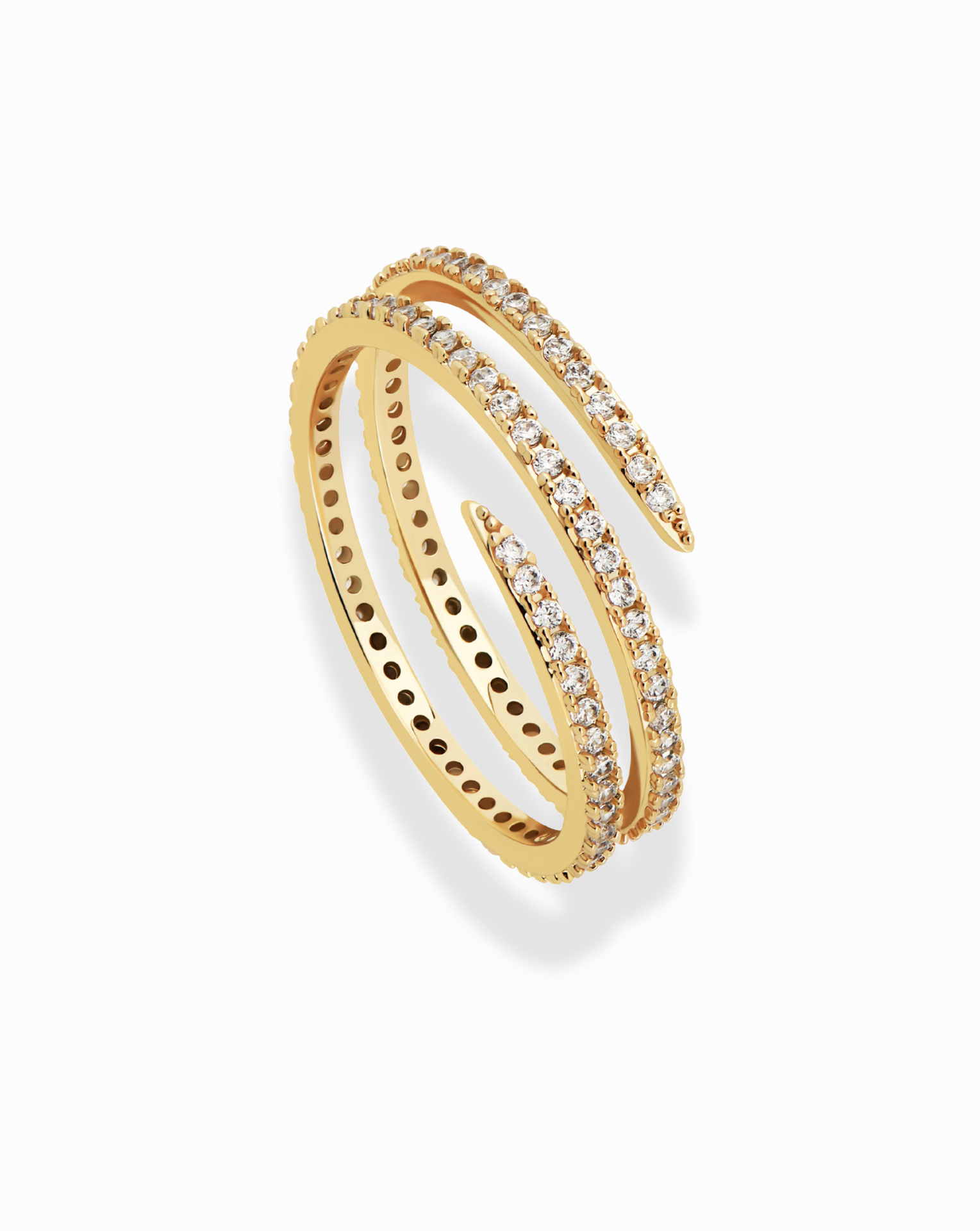 Golden spiral ring with pave diamonds. Jewelry product detail shot showcasing its design.