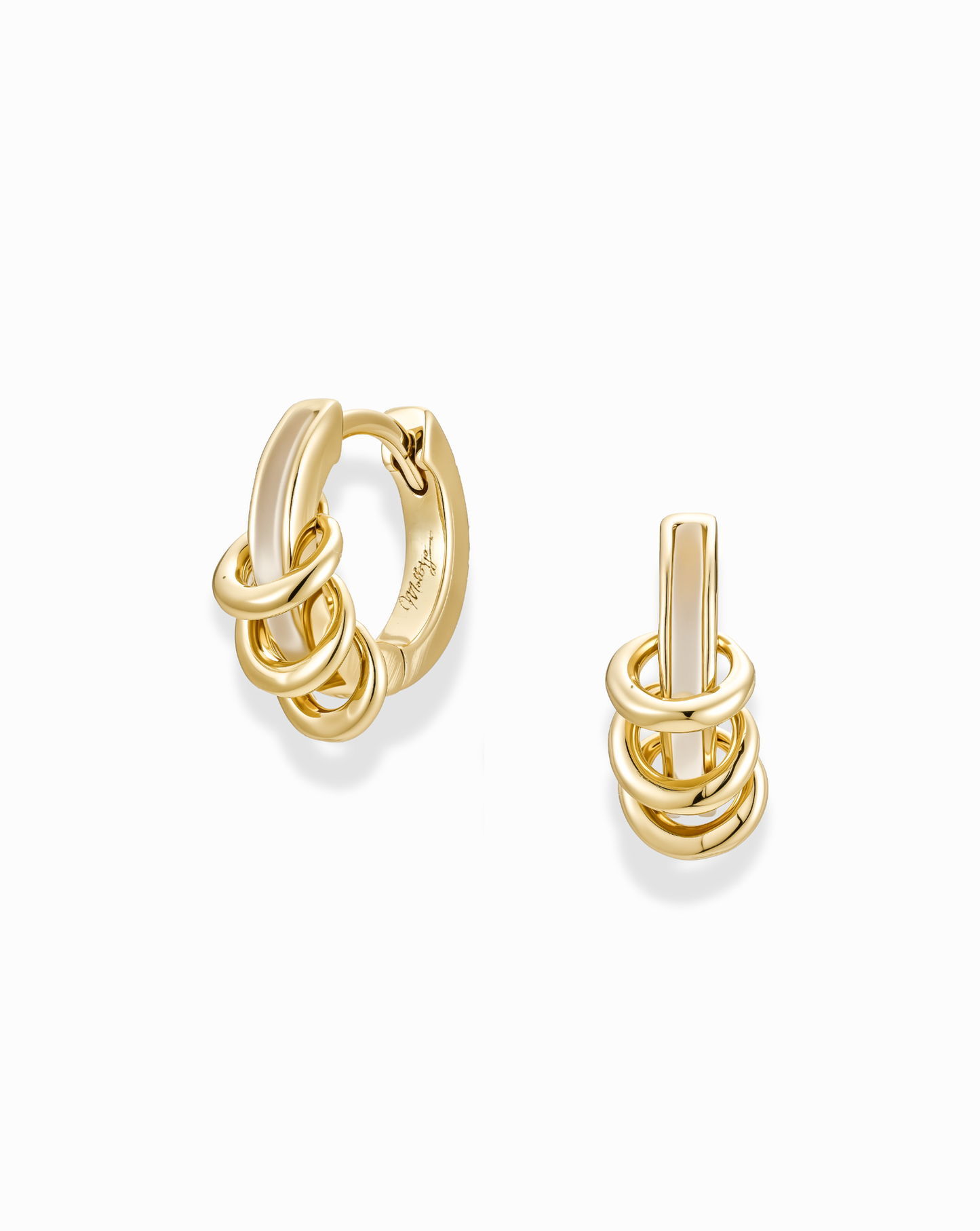 A pair of Mod + Jo Levi Huggies small gold hoop earrings, each featuring three interlocking, tarnish-resistant gold rings, shown on a white background.