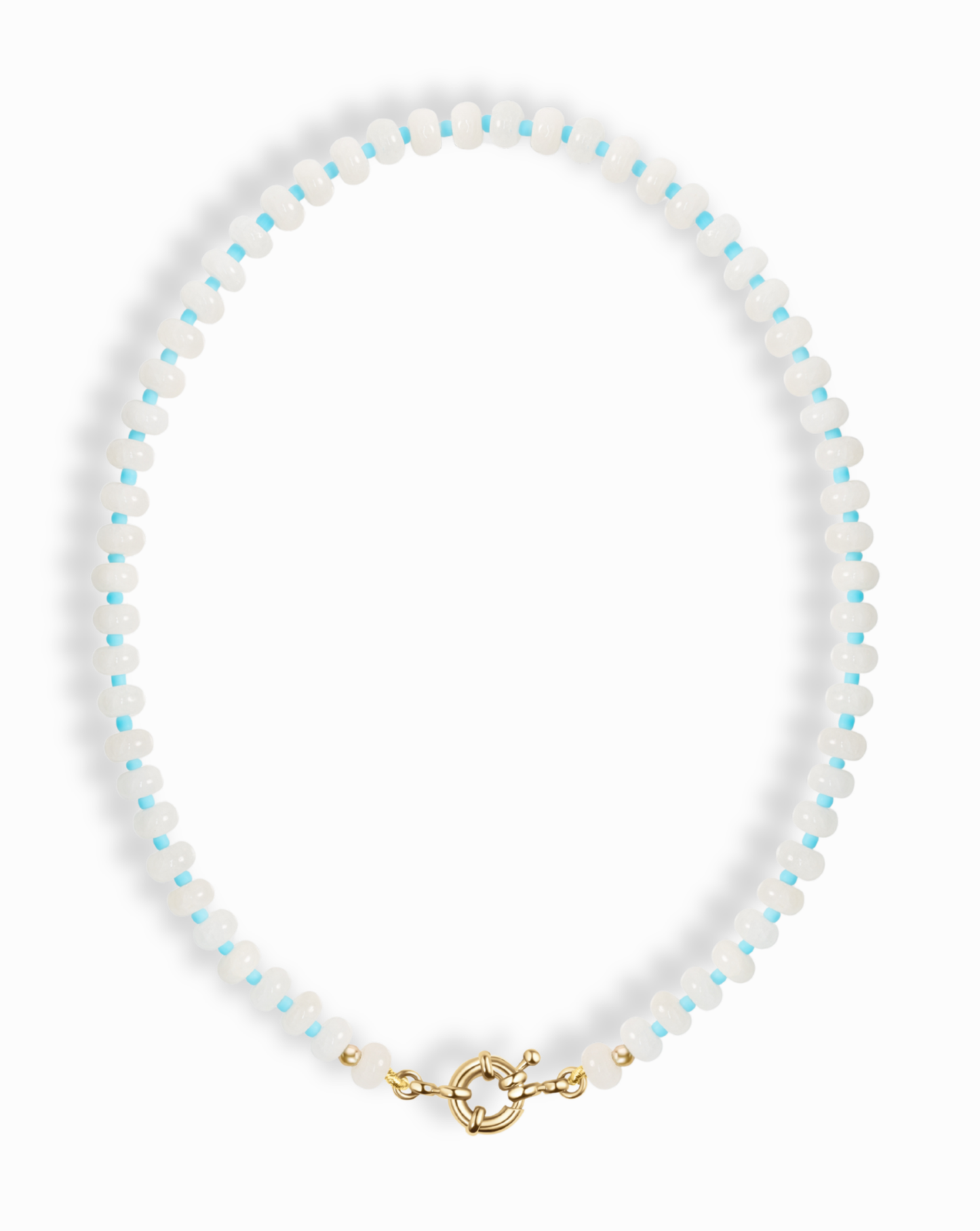 The Mod + Jo Macey Gemstone Necklace features alternating small white jade and light blue beads, accented with gold beads near the gold clasp, shown on a white background.