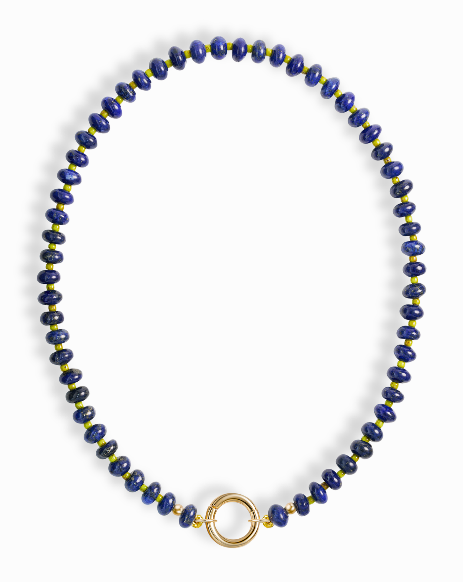 The Mod + Jo Macey Gemstone Necklace features round blue and gold-flecked lapis lazuli beads in a single strand, finished with a statement circular gold clasp at the center—all set against a white background.