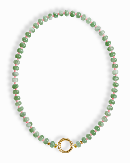 The Macey Gemstone Necklace by Mod + Jo features green jade and pink marbled beads with gold accents and a round gold clasp at the center.