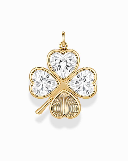 Introducing the Perry Four-Leaf Clover Locket Charm by Mod + Jo: this gold charm features a classic four-leaf clover design, with each leaf accented by a heart-cut CZ gemstone. Crafted with a gold stem and backing, it includes a small loop for easy attachment to your favorite chain—offering a charming, sparkling alternative to traditional locket charms or pendants.