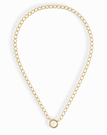 The Presley Charm Clip Necklace by Mod + Jo features 14k gold plating, evenly spaced oval links, and a central circular clasp—ideal as a base chain for charms. Shown against a white background.