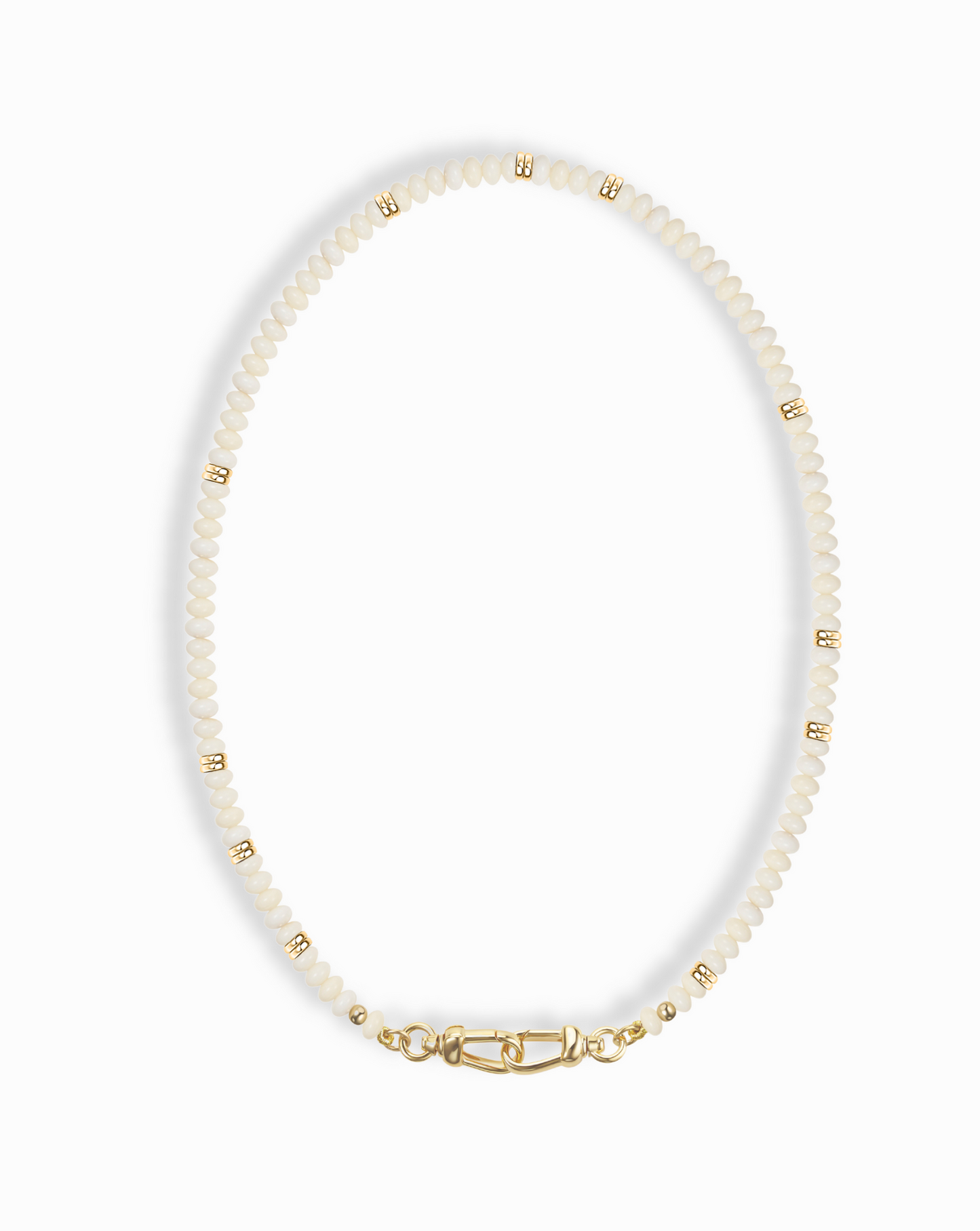Close-up of the Sonia Gemstone Necklace, featuring delicate white beads and gold accents, highlighting its elegant design.