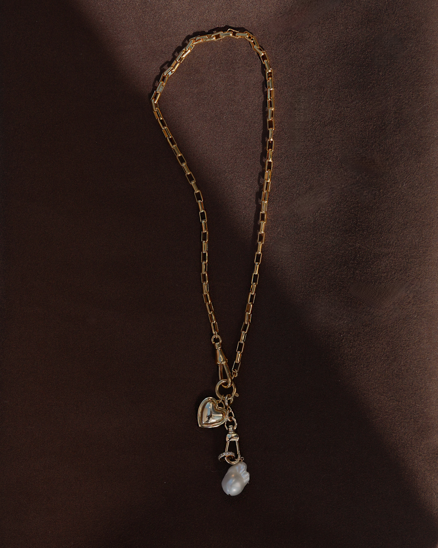 gold chain necklace with heart charm and pearl charm