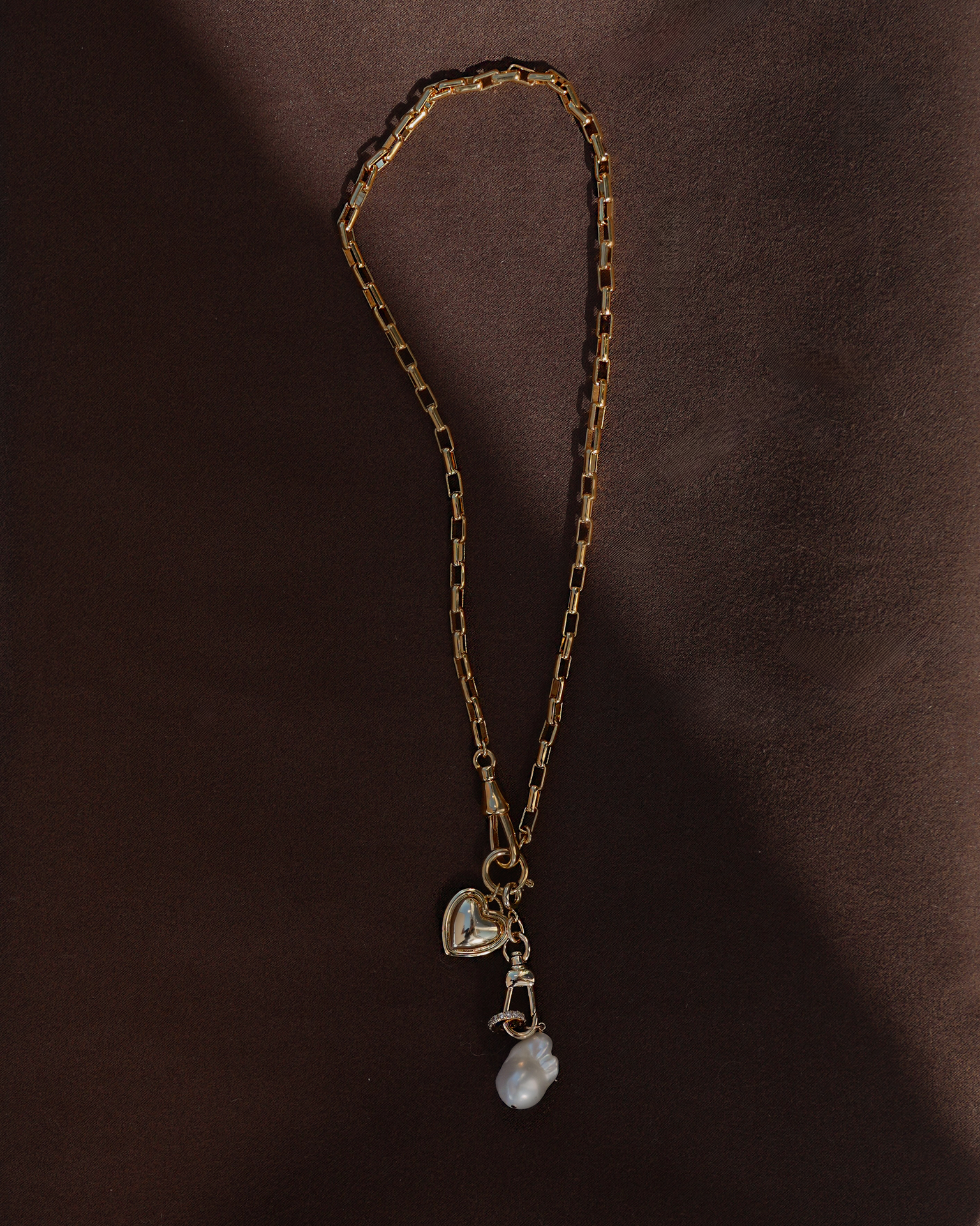 gold chain necklace with heart charm and pearl charm