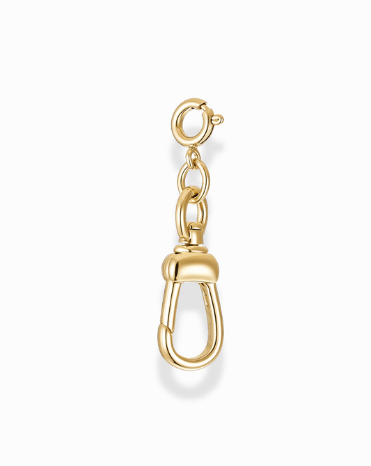 Gold watch clasp charm enhancer clip on a white background
